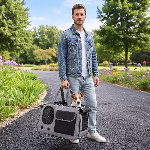 Homme tiens sac de transport pour chien double poignées