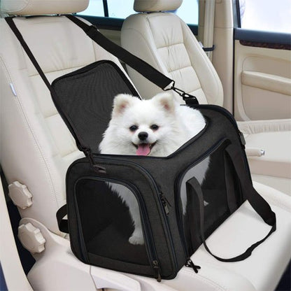 sac de transport chien noir sur siège voiture beige